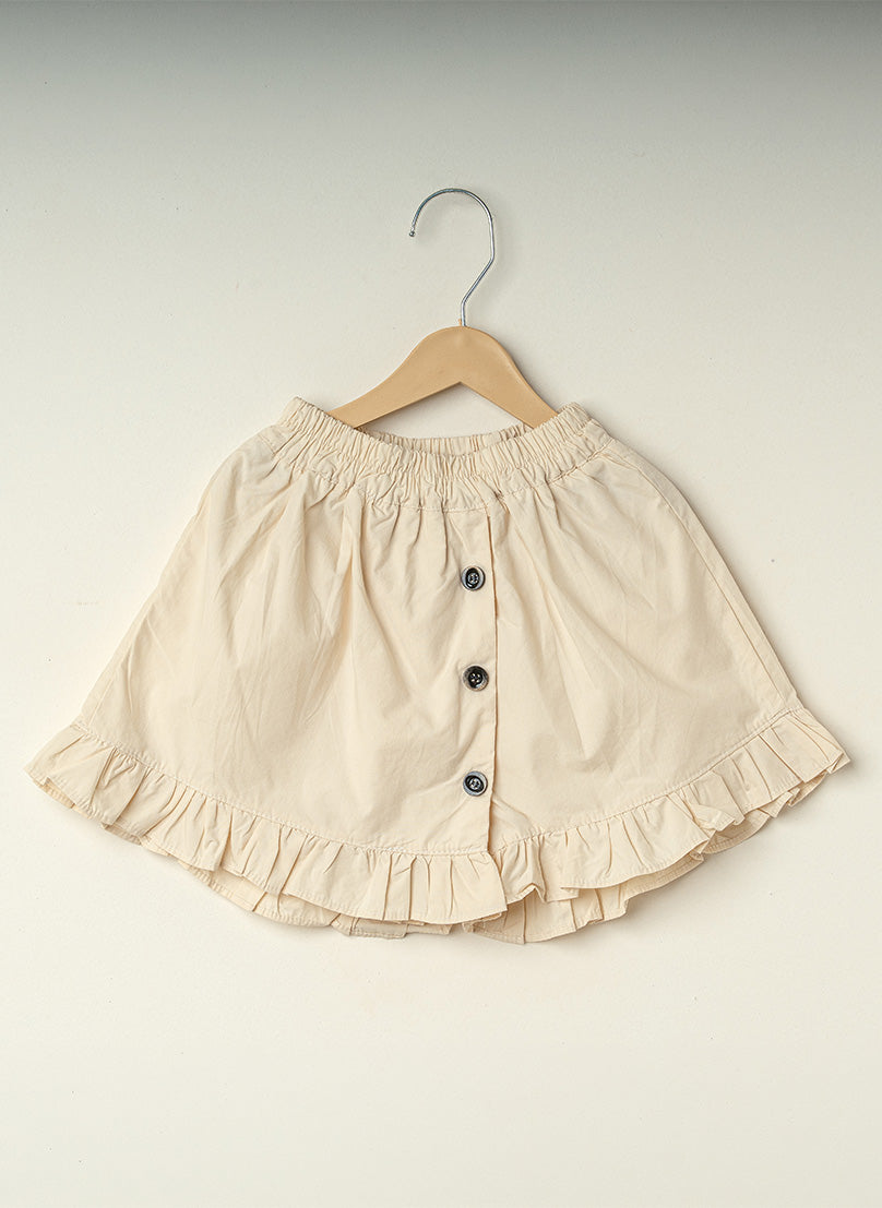 Cream Ruffle Button Shorts